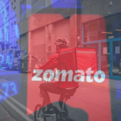 Zomato delivery partner using a smartphone with icons representing savings, budgeting and insurance