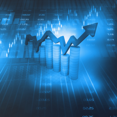 Investor tracking FTSE 100 index on a digital screen