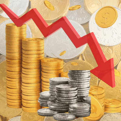 gold bars and silver coins with a red downward arrow showing the recent decline in precious metal prices
