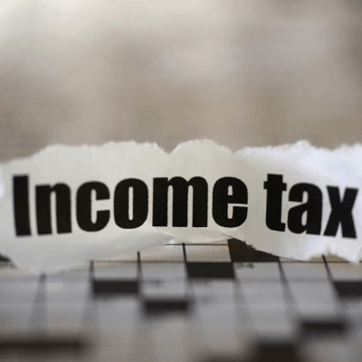 Salaried individual calculating income tax liability after Union Budget 2026 announcements